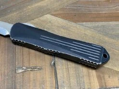 Heretic Manticore E Battleworn Black OTF Automatic Knife 3" Recurve Stonewash H029-2A-BATTLE -Helle Shop heretic knives heretic manticore e battleworn black otf automatic knife 3 recurve stonewash h029 2a battle 39393558298836