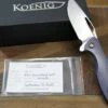Koenig Arius Titanium 20CV Burnished Polished Flats Blade Blue Anodized Bronze Hardware (USA)