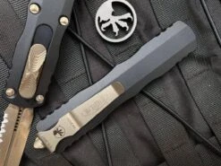 Microtech 227-15 Dirac Delta D/E Bronze Full Serrated Black Handle (USA) -Helle Shop microtech microtech 227 15 dirac delta d e bronze full serrated black handle usa 39393618297044