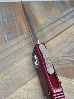Microtech 232-15 MR UTX-85 D/E Bronze Merlot Full Serrated Blade (USA) 8 Microtech 232-15 MR UTX-85 D/E Bronze Merlot Full Serrated Blade (USA) -Helle Shop microtech microtech 232 15 mr utx 85 d e bronze merlot full serrated blade usa 39393619542228
