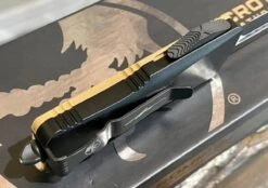 Microtech 238-1GTTAS Troodon Mini 1.99" D/E SS Tan G10 OTF Auto Knife -Helle Shop microtech microtech 238 1gttas troodon mini 1 99 d e ss tan g10 otf auto knife 39393619968212