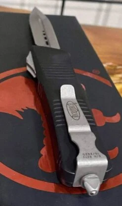 Microtech Troodon D/E OTF Automatic Knife (3" Apocalyptic) 138-10AP -Helle Shop microtech microtech troodon d e otf automatic knife 3 apocalyptic 138 10ap 41986933522644