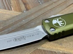 Microtech UTX-85 233-10 APOD T/E OTF OD Green Auto Knife Apoc Finish (USA) 8 Microtech UTX-85 233-10 APOD T/E OTF OD Green Auto Knife Apoc Finish (USA) -Helle Shop microtech microtech utx 85 233 10 apod t e otf od green auto knife apoc finish usa 39393635336404